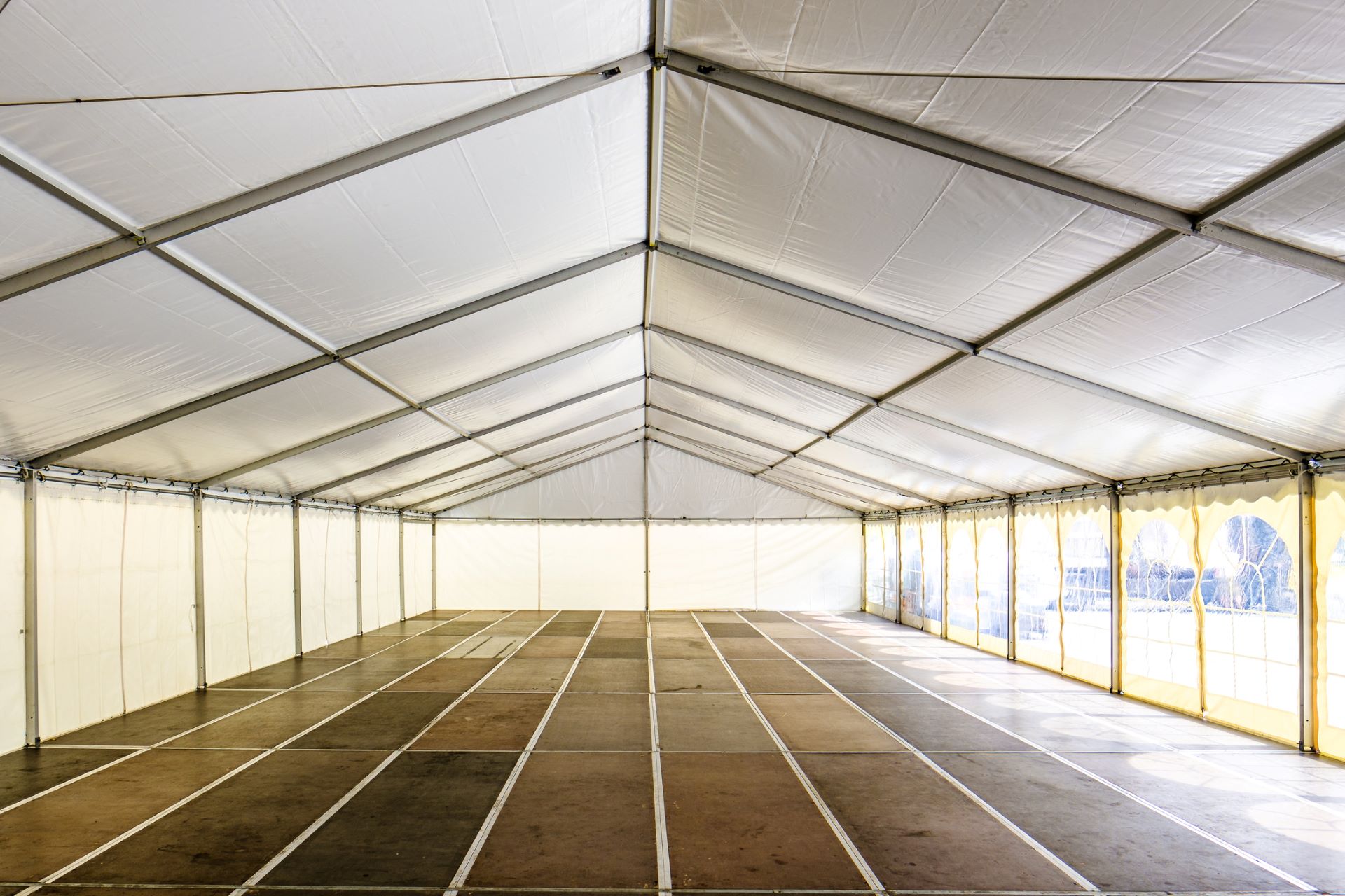 A large interior space of an aluminium frame marquee