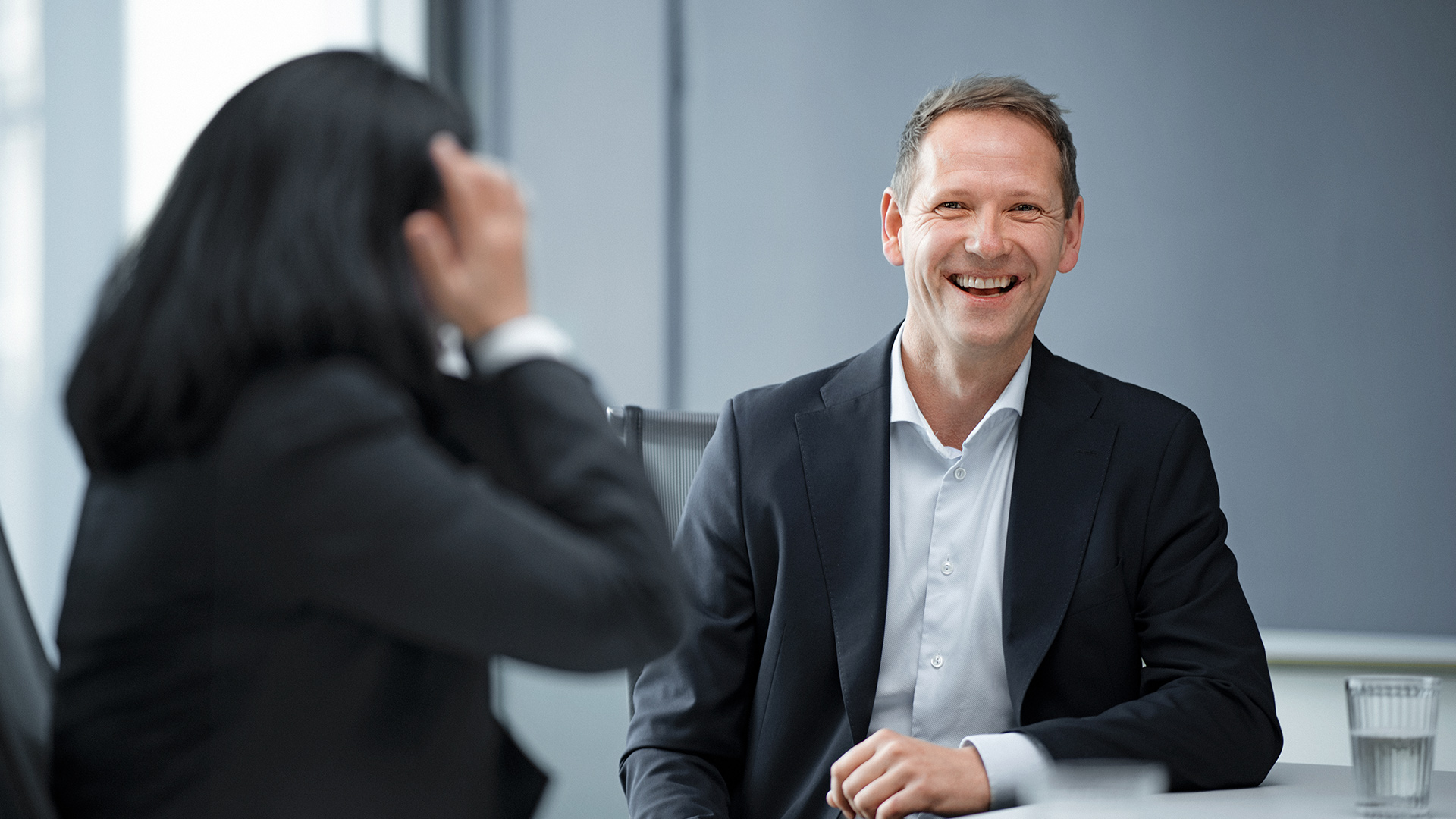 a man and a woman smiling