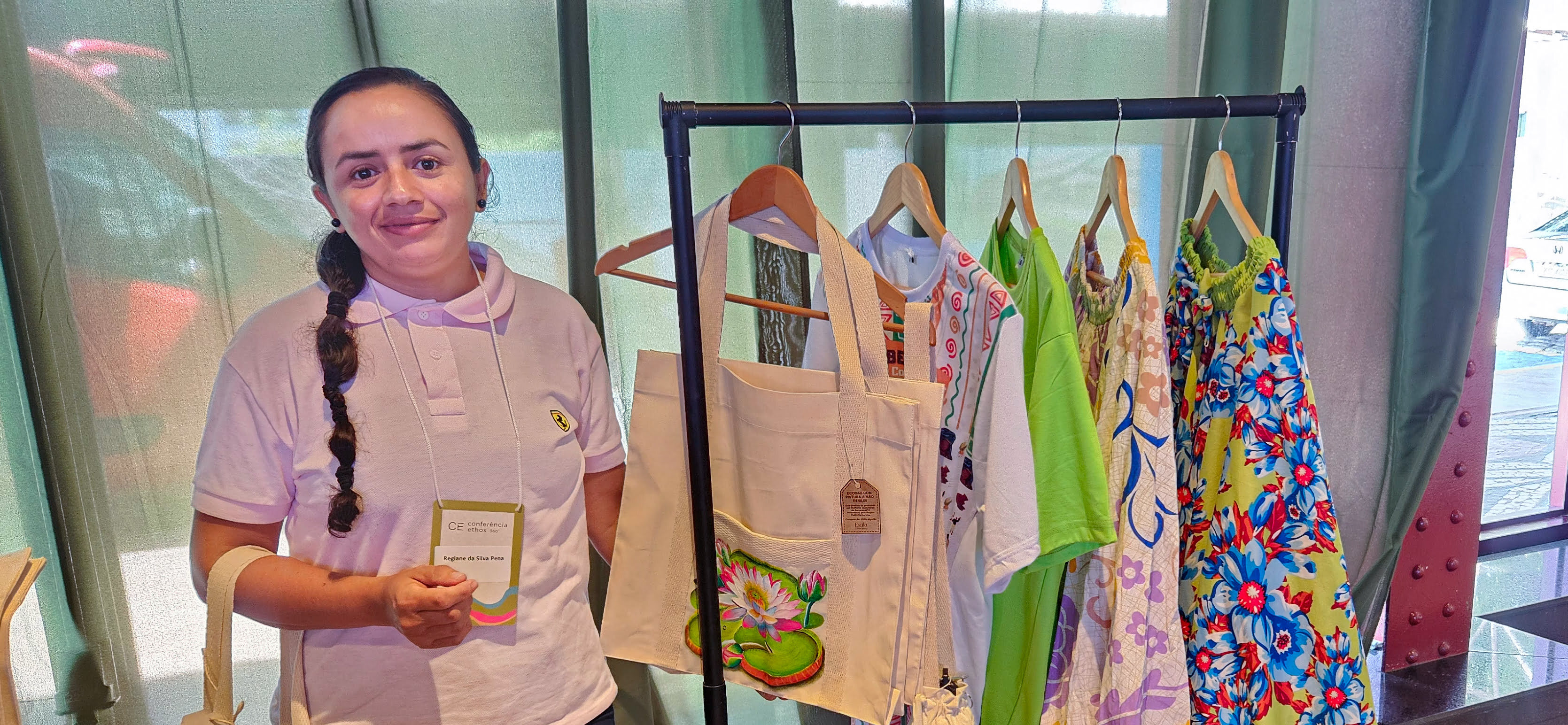 a person holding a bag of clothes