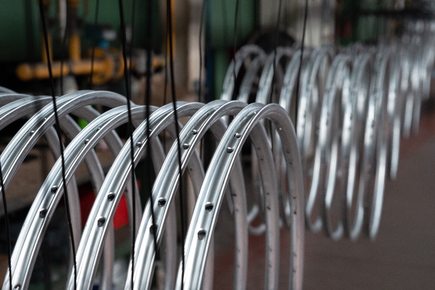a row of bicycle rims