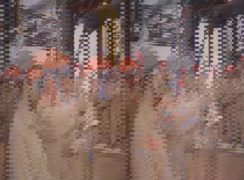 a group of people wearing protective gear