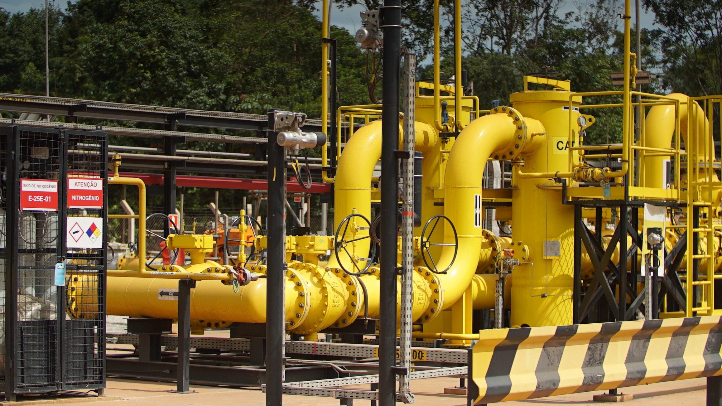 a yellow pipes on a road