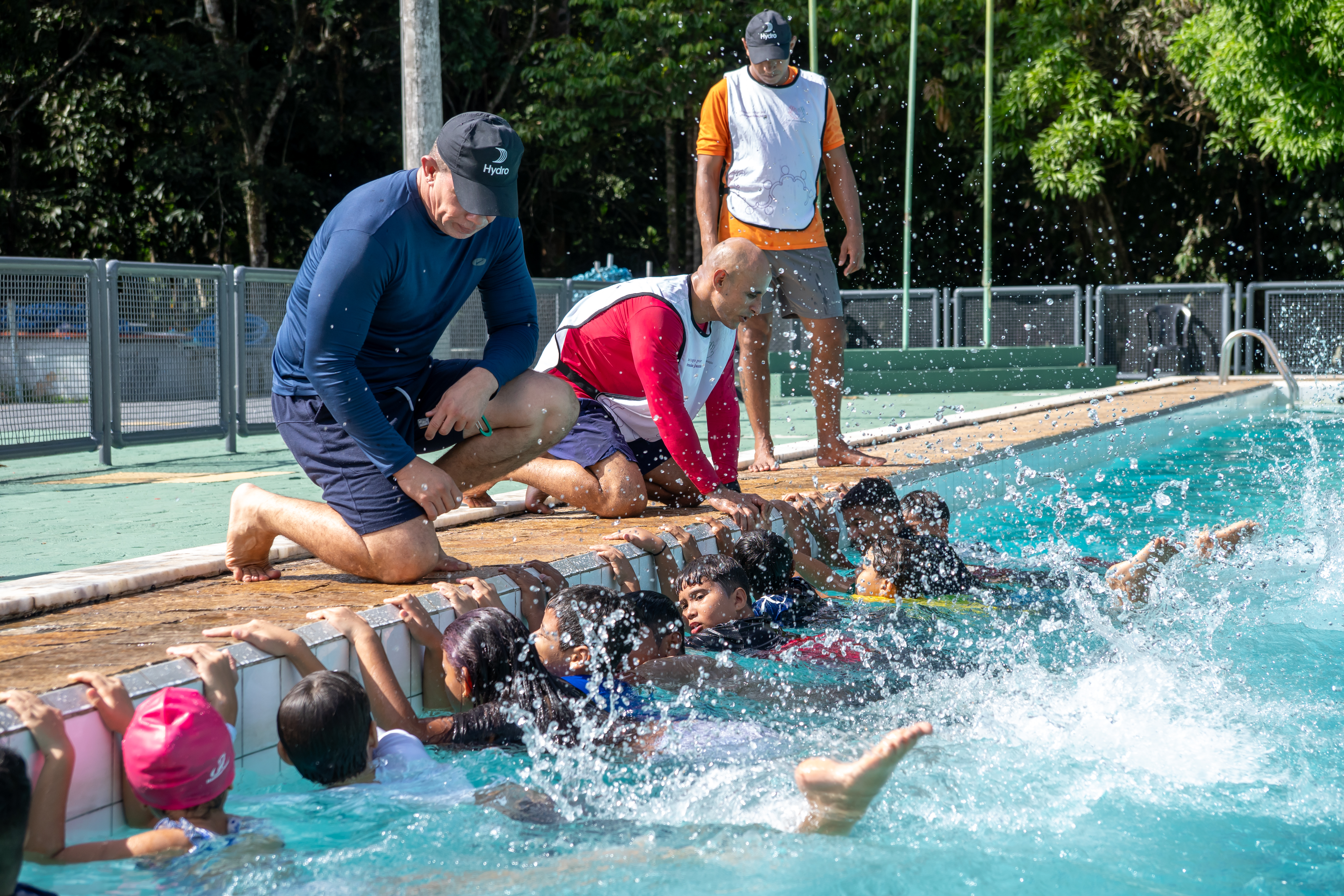 a group of people in a pool