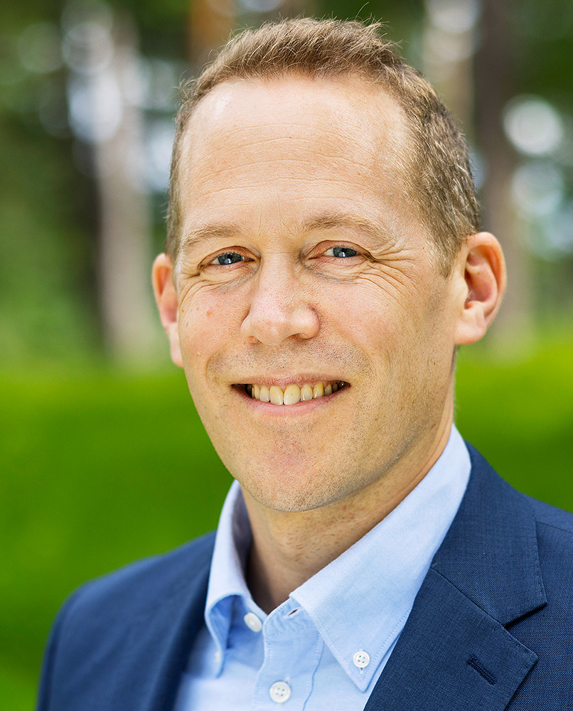 a man smiling for the camera