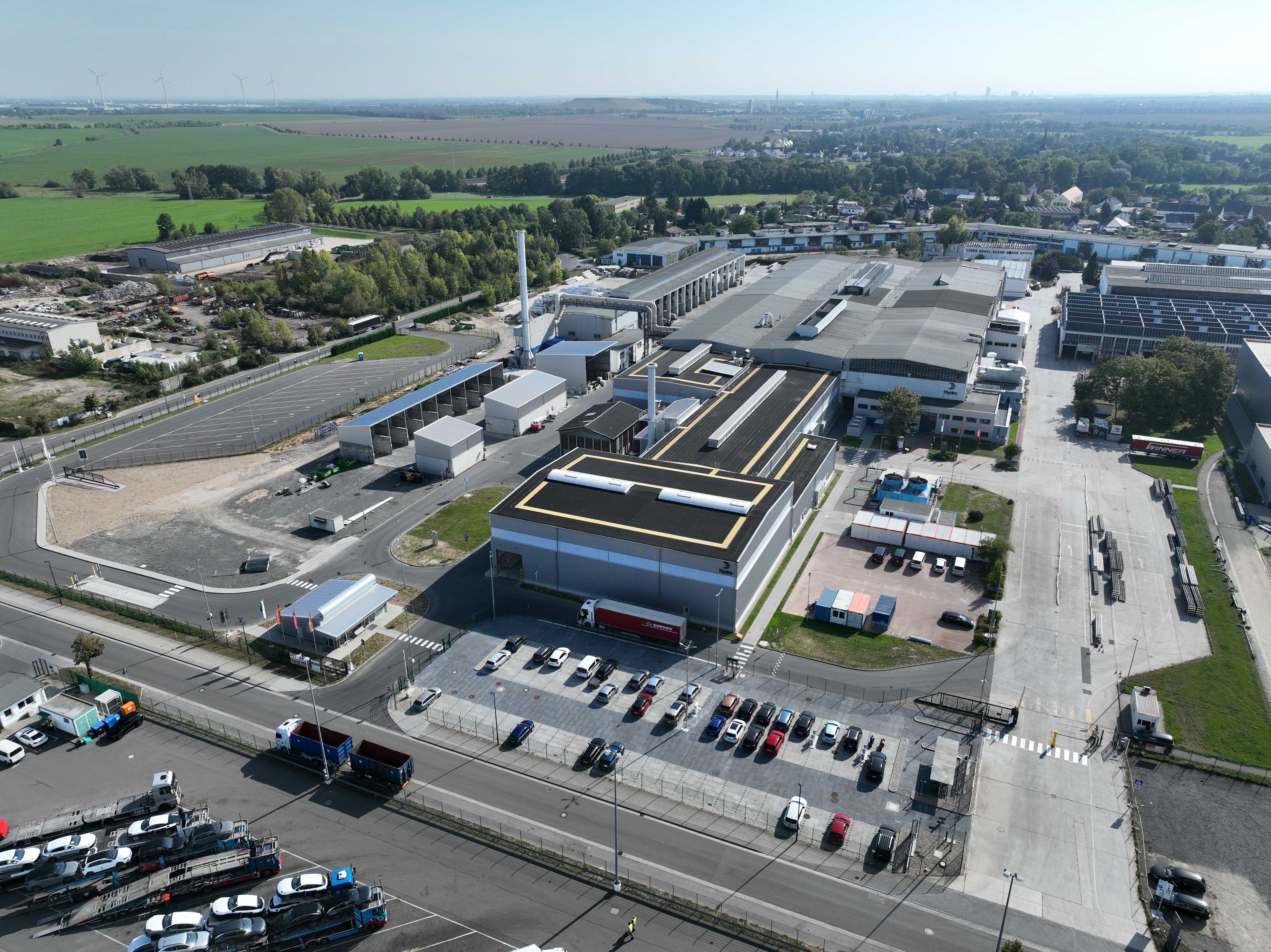 an industrial facility with a parking lot