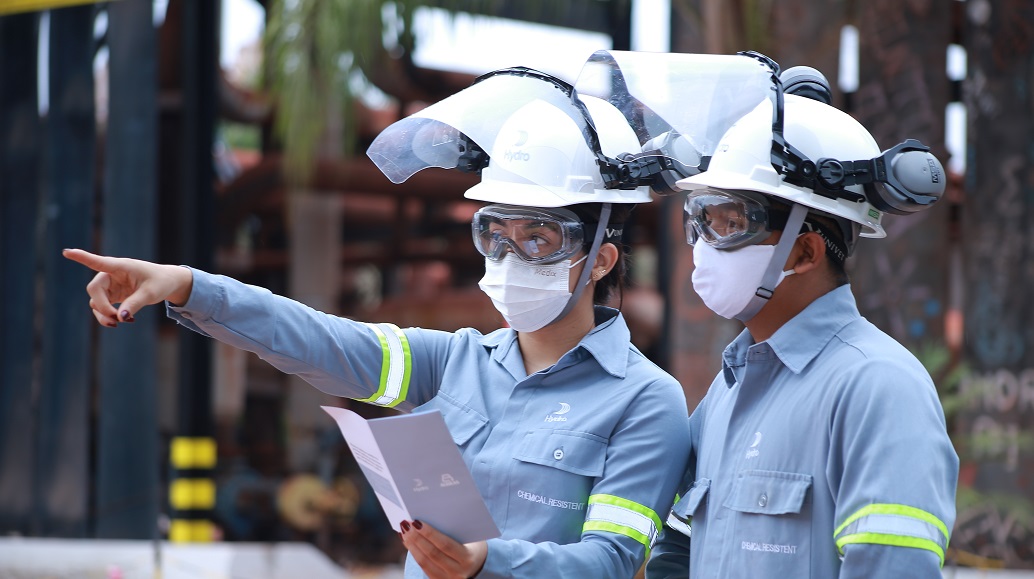 a couple of people wearing helmets and goggles