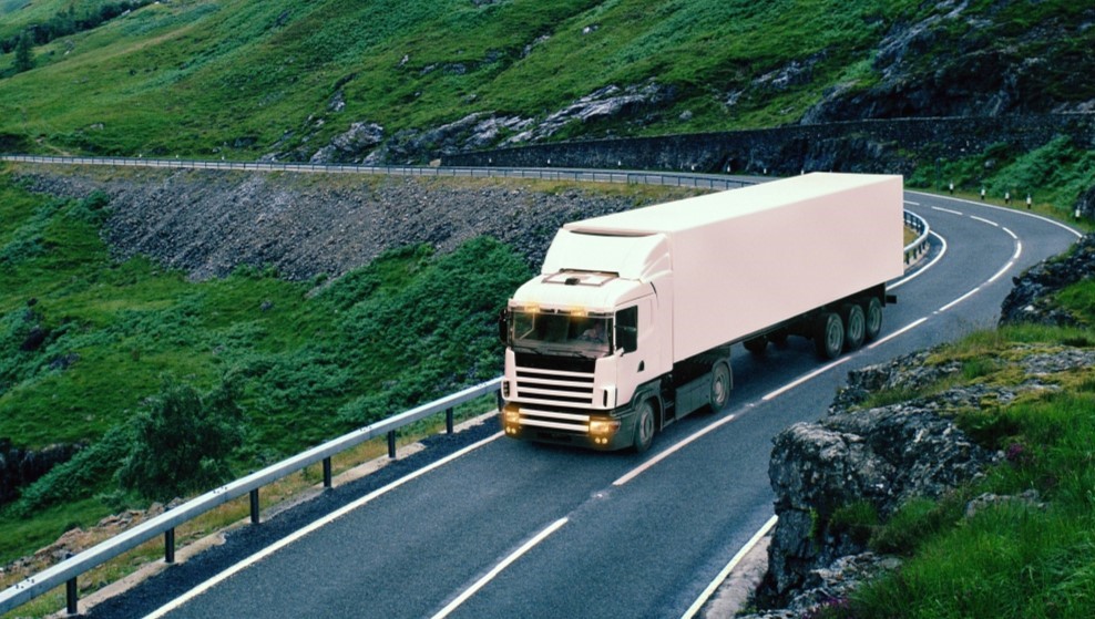 a truck driving down the road